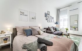 Sun-Splashed Retreat In The Heart Of A Vibrant Quarter